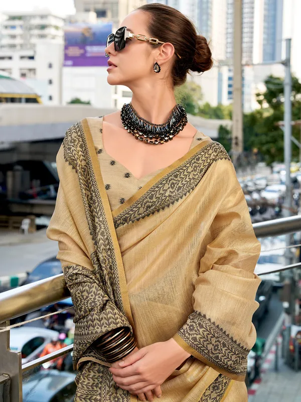 Beige linen tissue silk saree with print