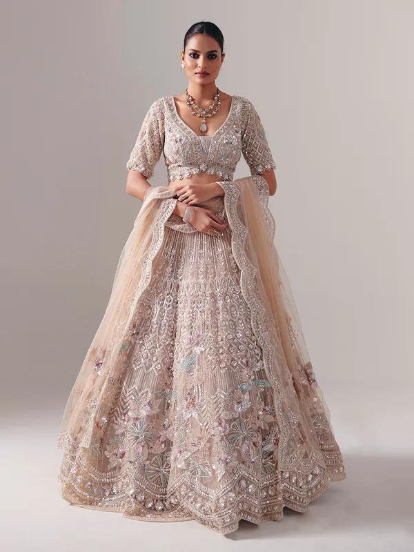Beige net diamond and pearl bridal lehenga choli