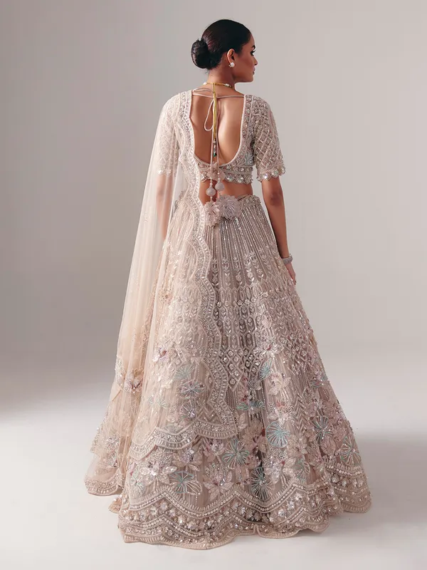 Beige net diamond and pearl bridal lehenga choli