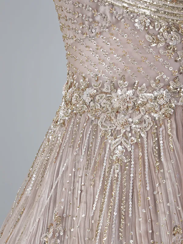 Beige net sleeveless sweetheart designer floor length gown