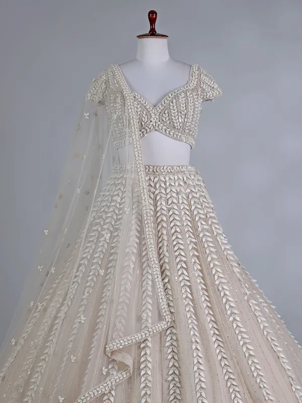 Beige net sweetheart wedding lehenga choli