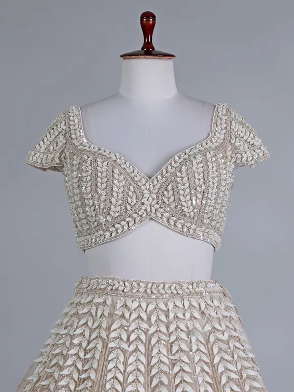 Beige net sweetheart wedding lehenga choli
