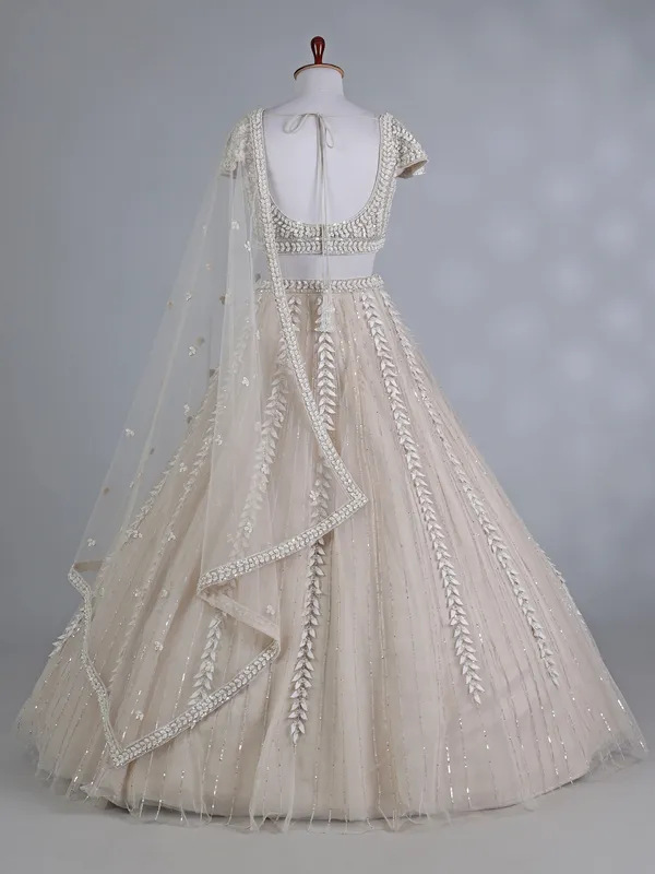 Beige net sweetheart wedding lehenga choli