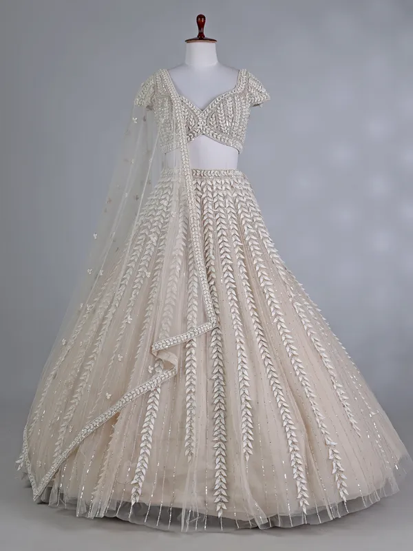 Beige net sweetheart wedding lehenga choli