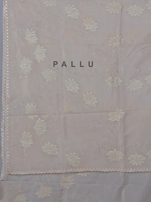 Beige organza saree with subtle resham and embroidery work