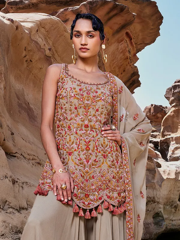 Beige palazzo salwar suit in georgette