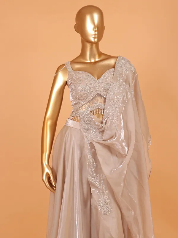 Beige palazzo suit in shimmering organza