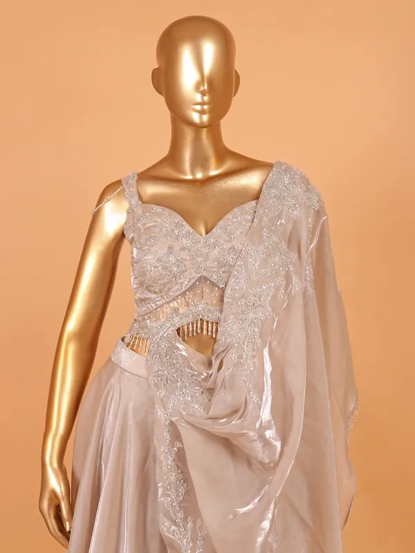 Beige palazzo suit in shimmering organza