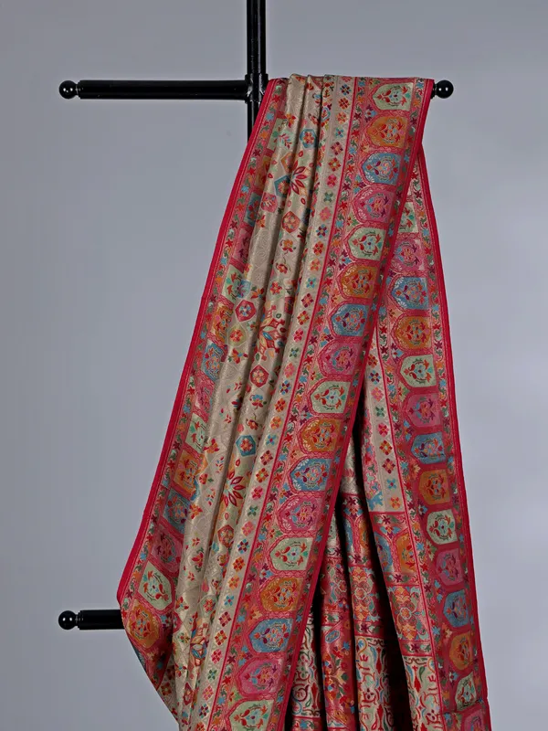 Beige pashmina silk saree with colorful motifs