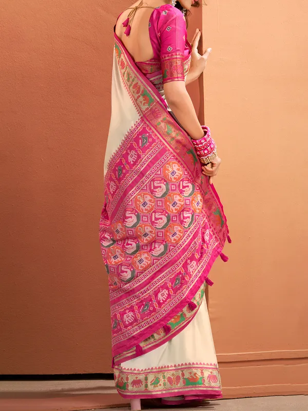 Beige patola silk saree for elegant affairs
