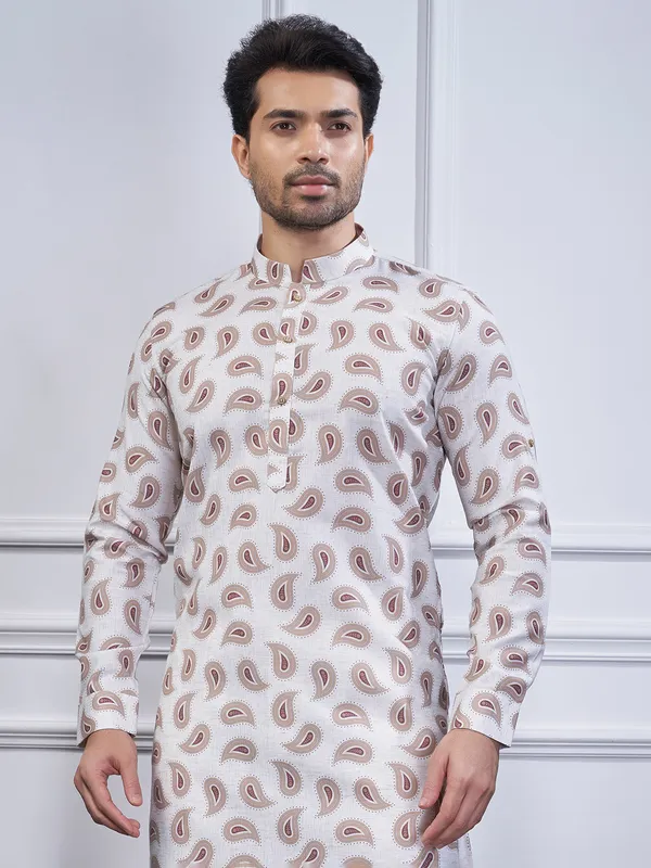 Beige printed cotton kurta suit for festive wear