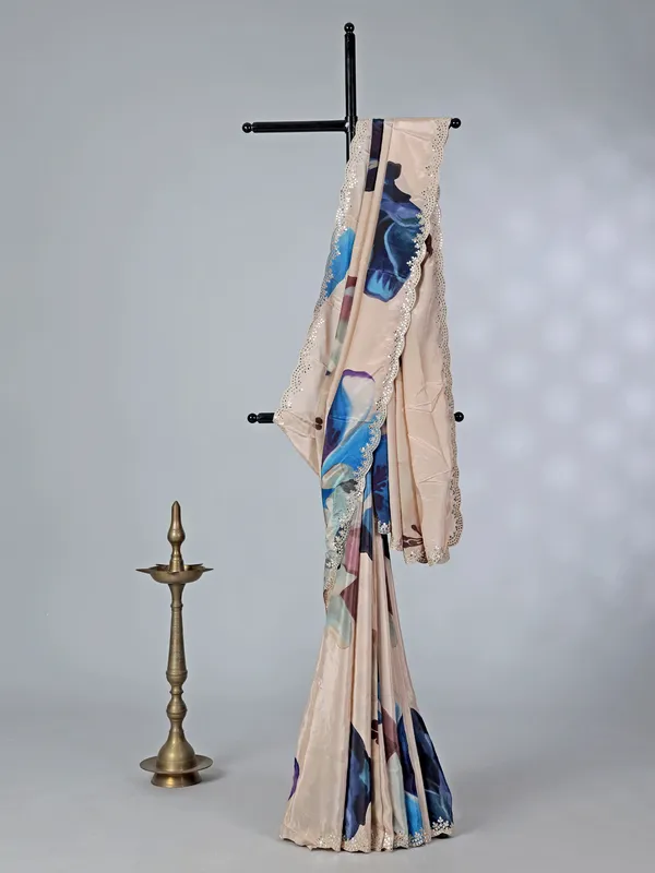 Beige printed crepe silk saree with mirror work