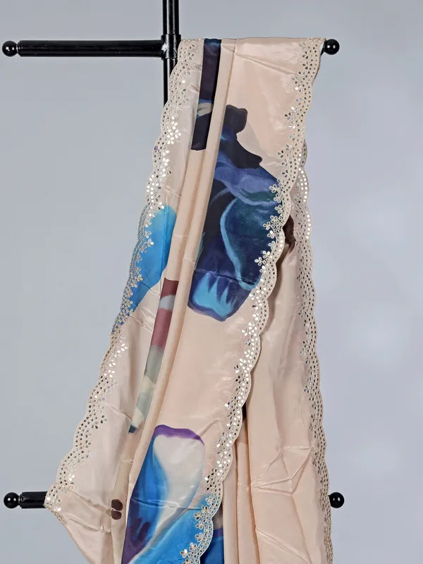 Beige printed crepe silk saree with mirror work