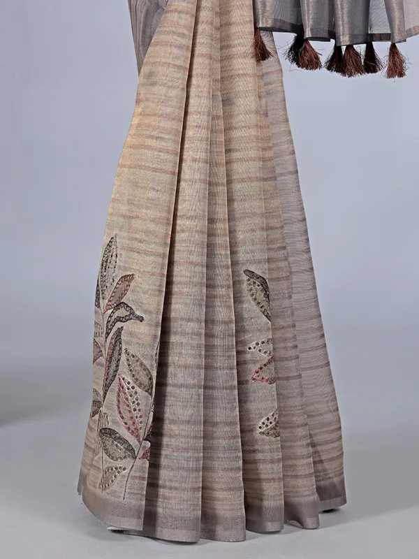Beige printed organza saree with zari detailing