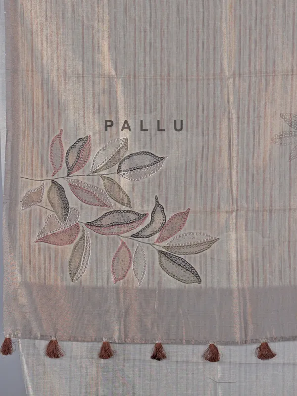 Beige printed organza saree with zari detailing