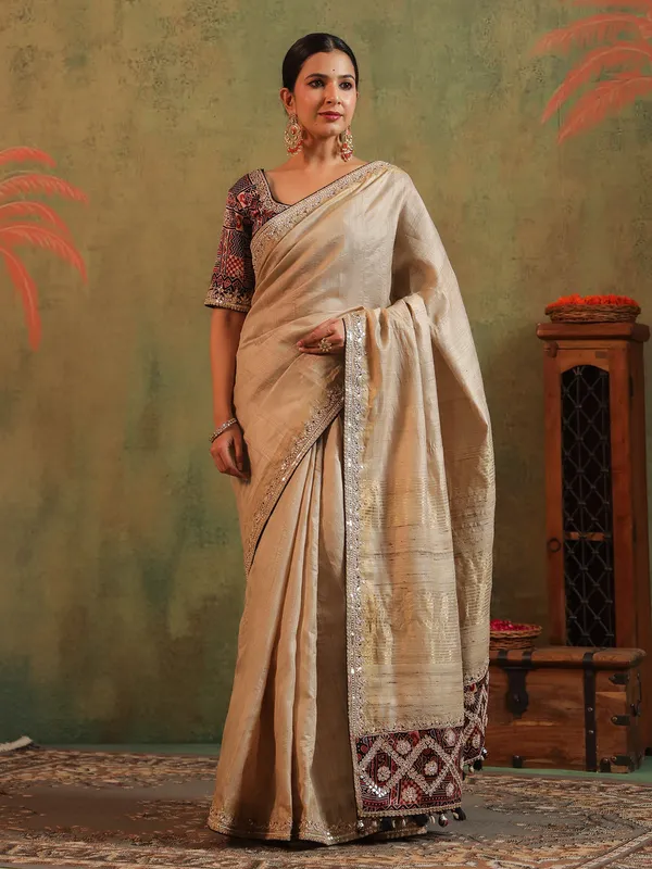 Beige printed silk saree with gota work