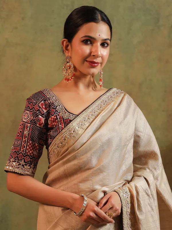 Beige printed silk saree with gota work