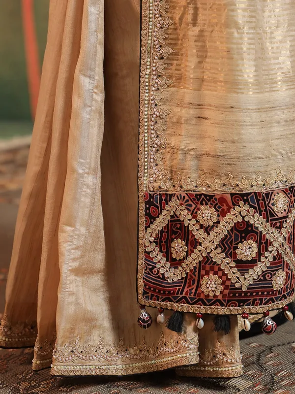 Beige printed silk saree with gota work