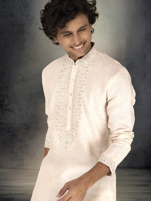 Beige pure linen embroidered festive kurta suit