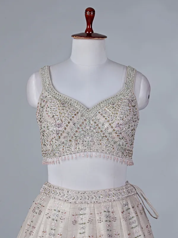 Beige raw silk bridal lehenga choli with dupatta