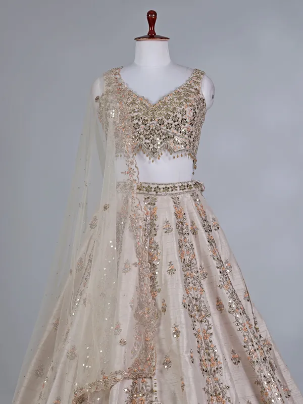Beige raw silk lehenga choli with sequins shine