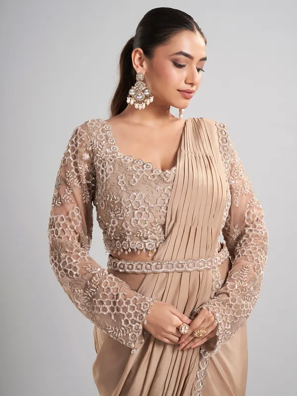 Beige satin silk party wear saree with luxurious embellishments
