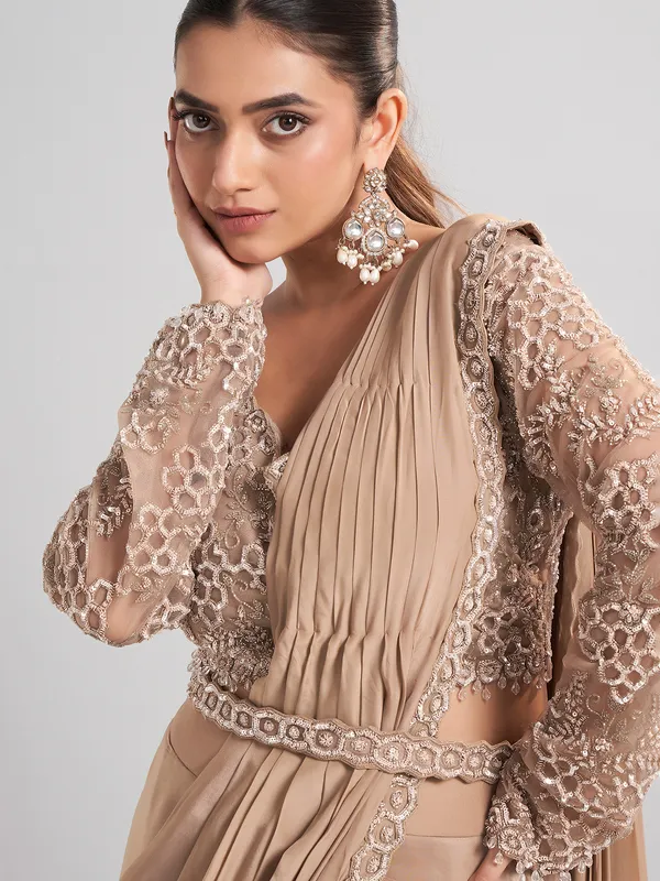 Beige satin silk party wear saree with luxurious embellishments
