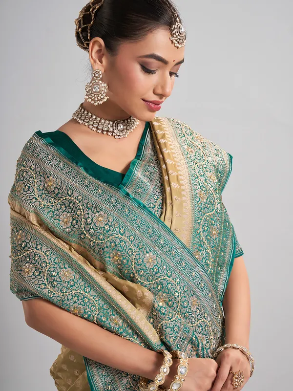 Beige satin silk saree with contrasting border for wedding wear