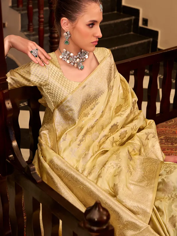 Beige satin silk saree with rich zari embellishment