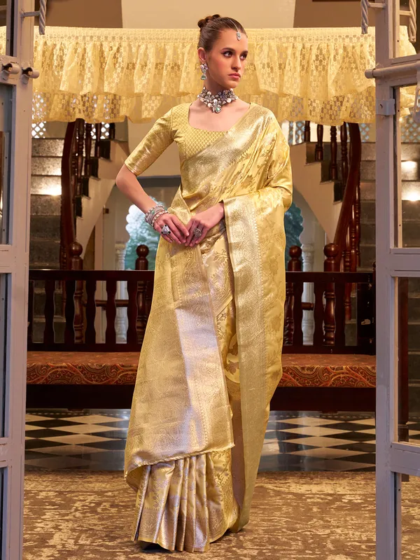 Beige satin silk saree with rich zari embellishment