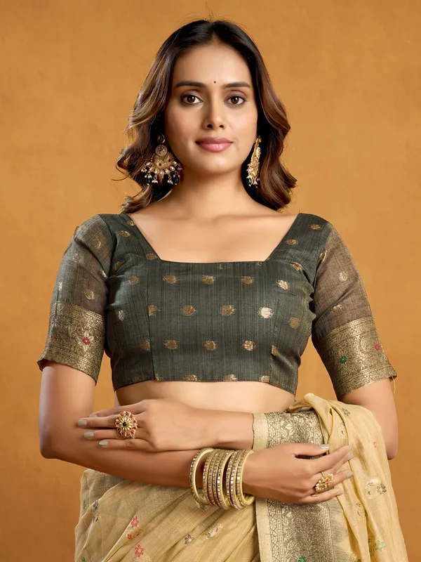 Beige semi cotton saree for graceful festive looks
