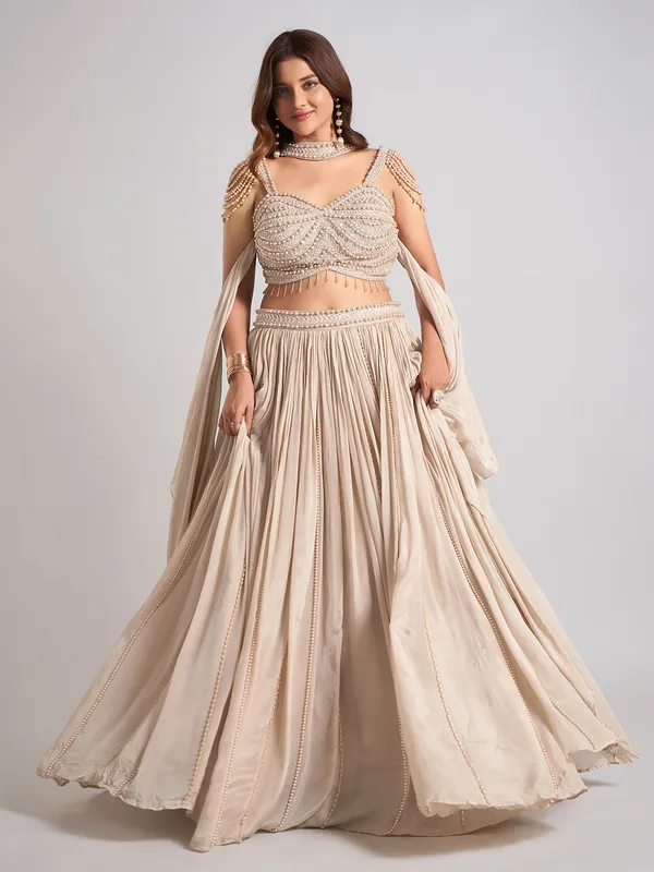 Beige silk cutdana lehenga choli for wedding wear