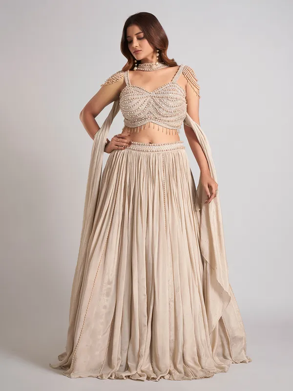 Beige silk cutdana lehenga choli for wedding wear