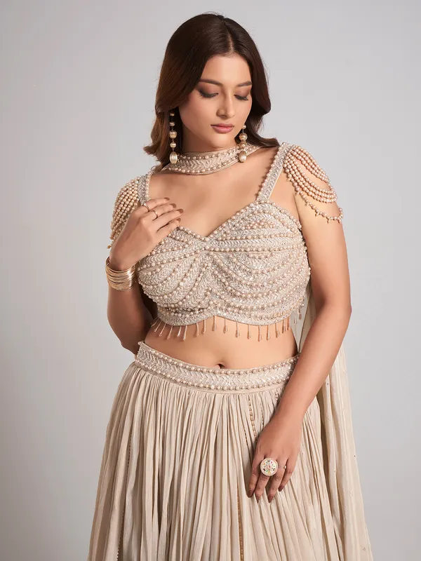 Beige silk cutdana lehenga choli for wedding wear