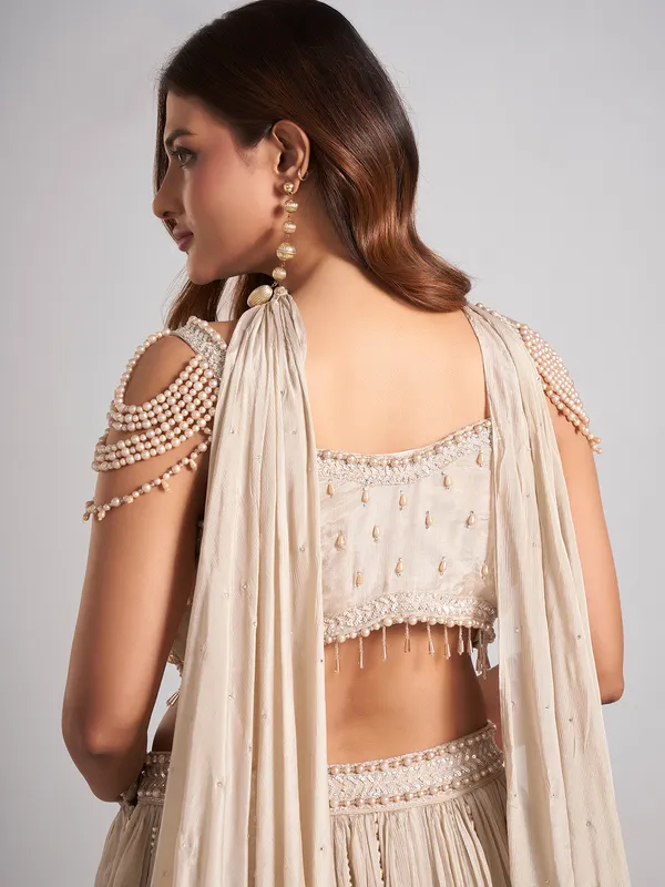 Beige silk cutdana lehenga choli for wedding wear