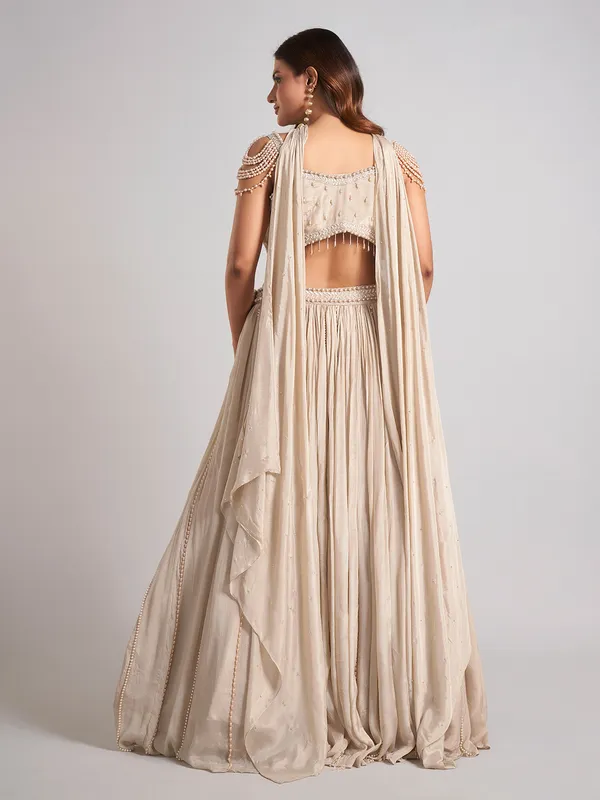 Beige silk cutdana lehenga choli for wedding wear