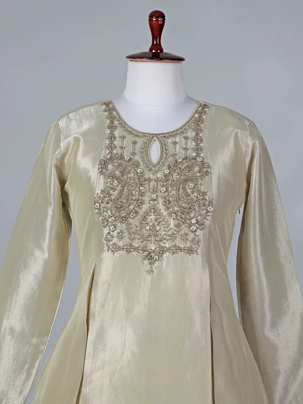 Beige silk keyhole neck lehenga choli with dupatta