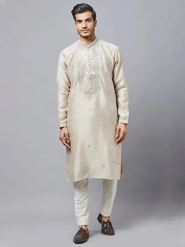 Beige silk kurta set for festive events