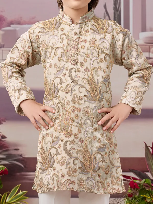 Beige silk kurta set with classic motifs