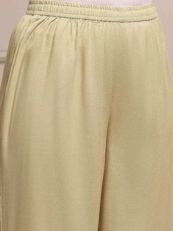 Beige silk kurti set for festive celebration