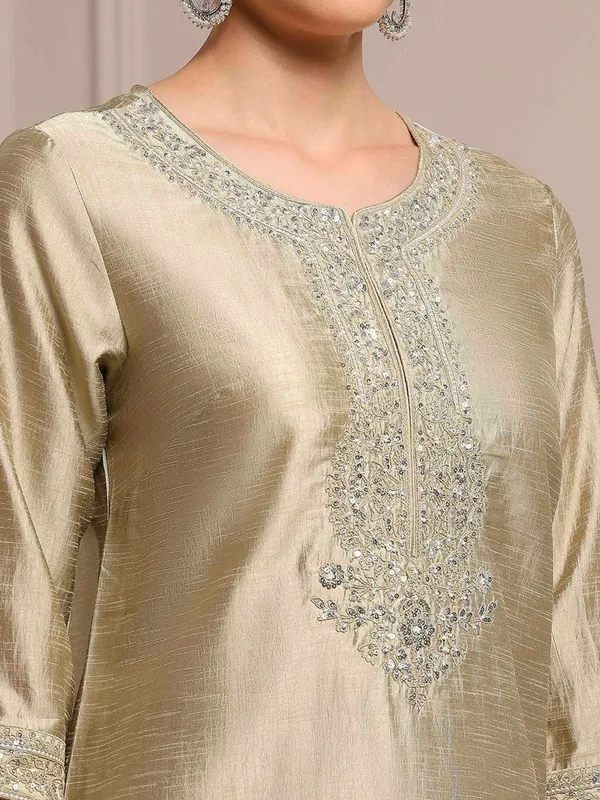 Beige silk kurti set for festive celebration