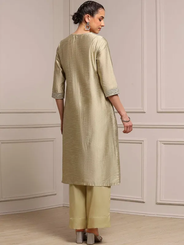 Beige silk kurti set for festive celebration