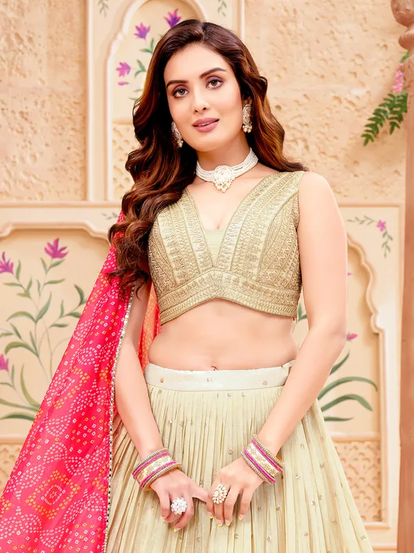 Beige silk lehenga choli with contrast dupatta