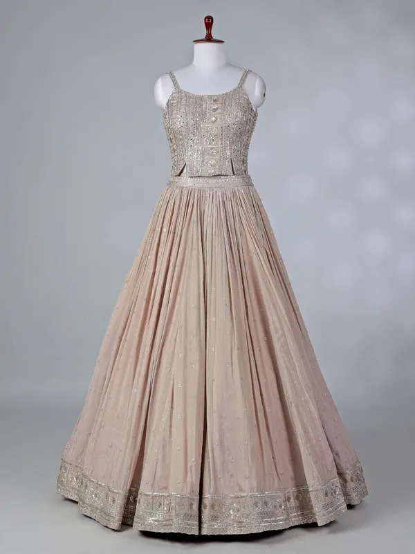 Beige silk lehenga choli with mirror embellishments