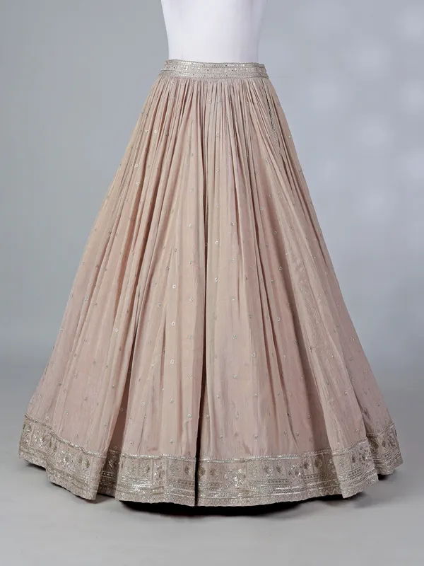Beige silk lehenga choli with mirror embellishments