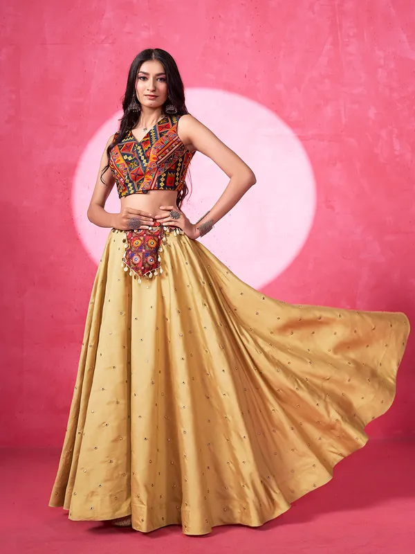 Beige silk navratri lehenga choli with V neck choli