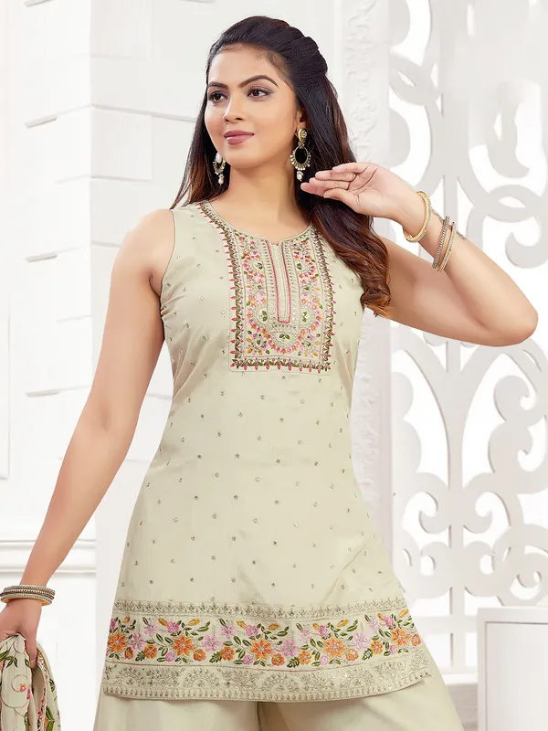 Beige silk palazzo suit with printed dupatta