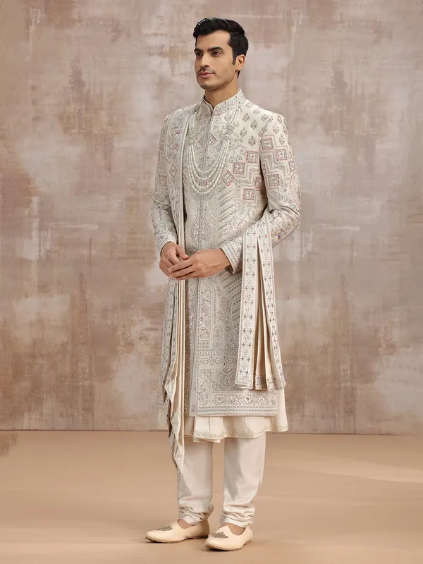 Beige silk peshwa-style sherwani with dupatta