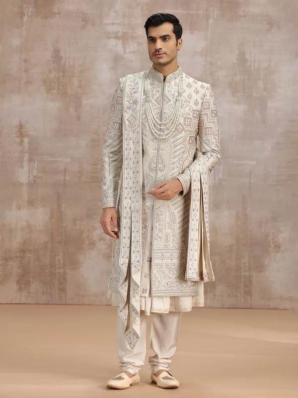 Beige silk peshwa-style sherwani with dupatta