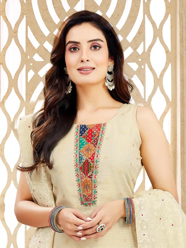 Beige silk salwar suit with aabla and zardosi work